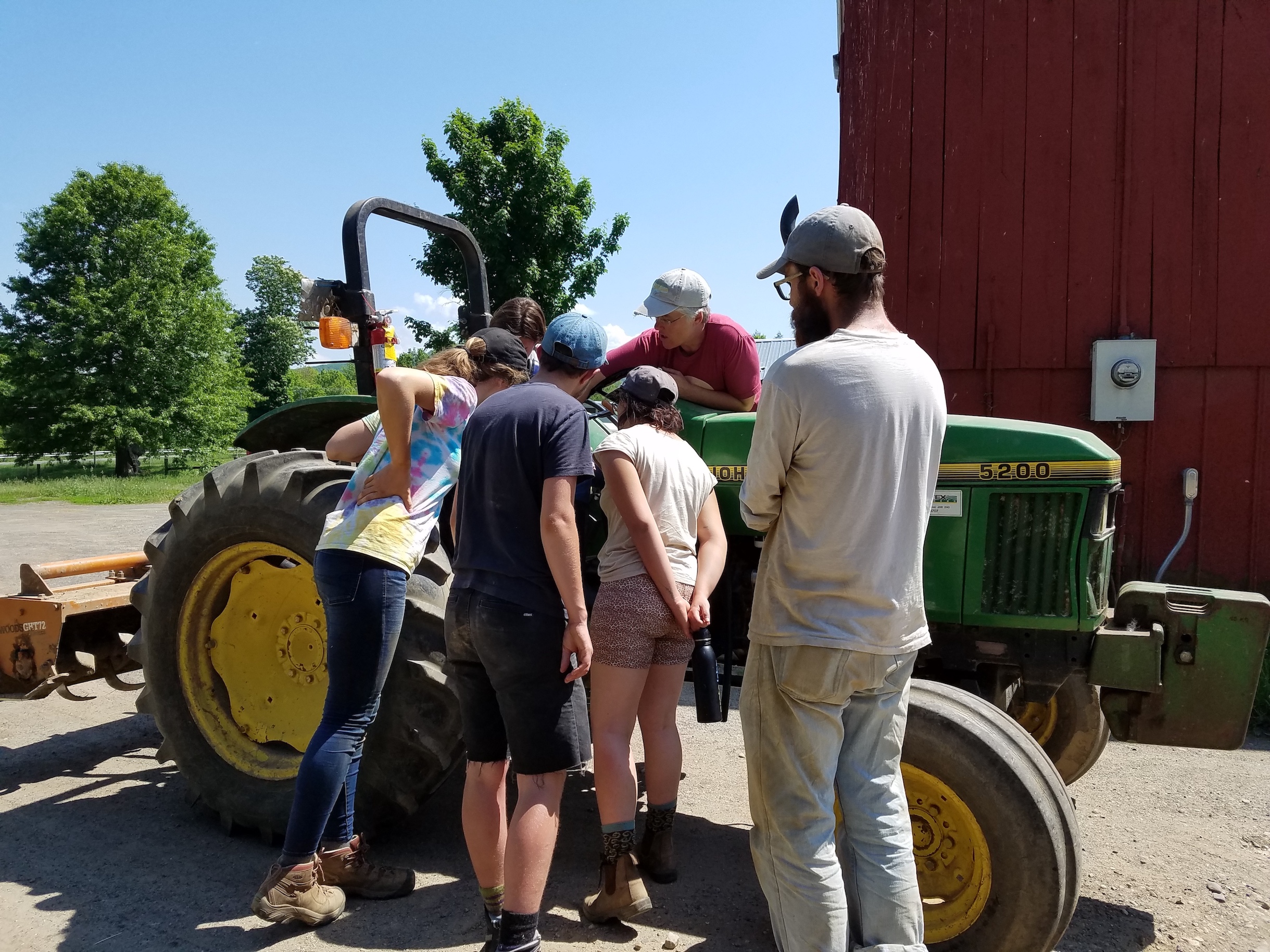 Students gathered around a tractor