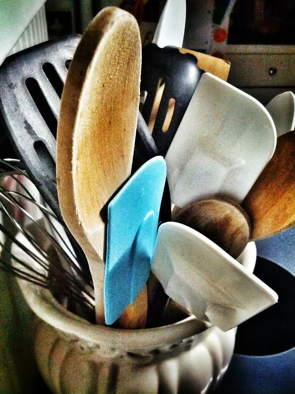closeup of kitchen utensils in a jar