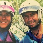 Couple in helmets smiling