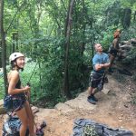 Earl and students rappellingin the woods