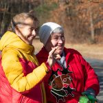 Glenna receives a frog stained glass piece