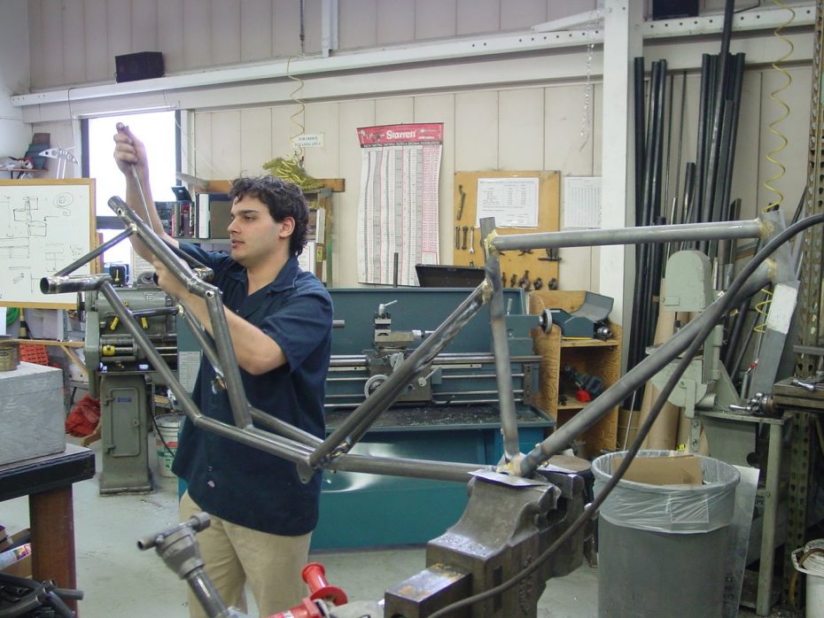 Student working of custom bicycle project
