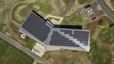 Aerial view of R.W. Kern Center showing rainwater collection, solar panels, and and raingardens.