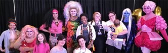 Students with drag performers at the Queer Conference
