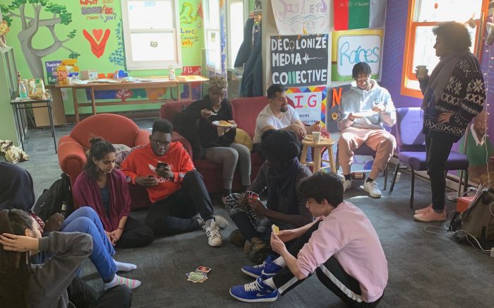 Students playing cards and eating breakfast in the Cultural Center