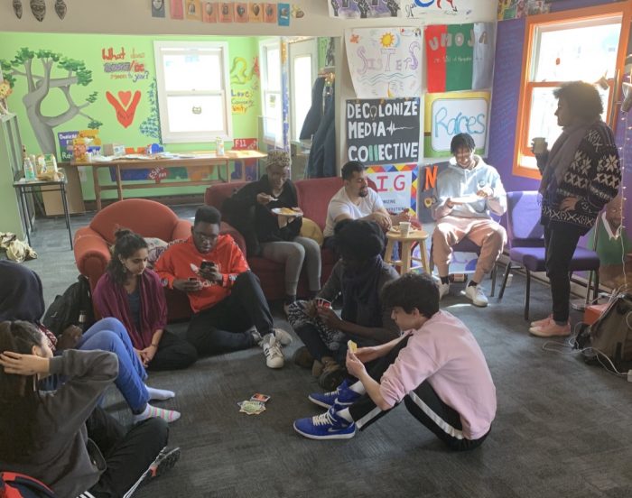 Students playing cards and eating breakfast in the Cultural Center