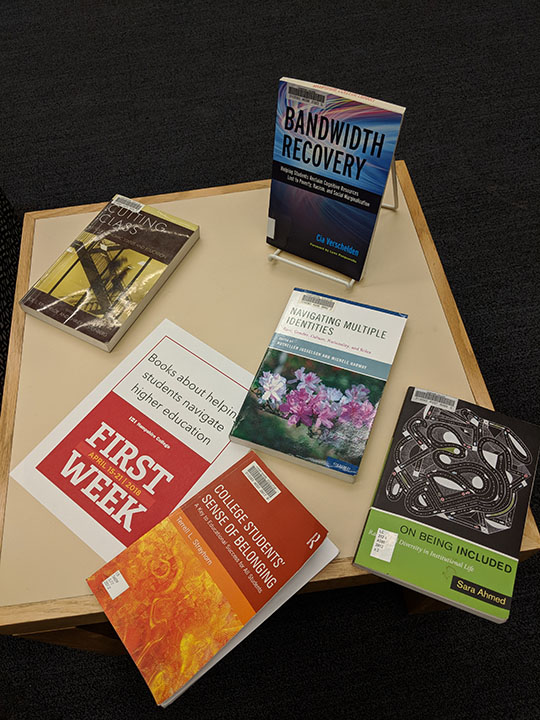 A photograph of some books about navigating college on display